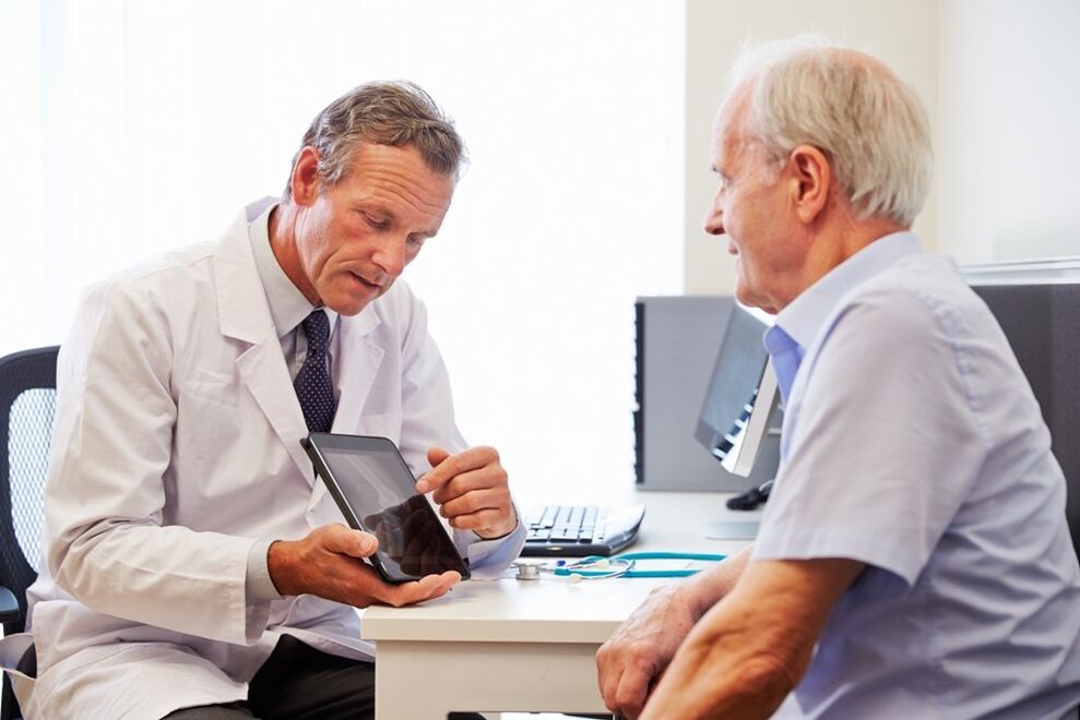 Patient with prostatitis during an appointment with the doctor
